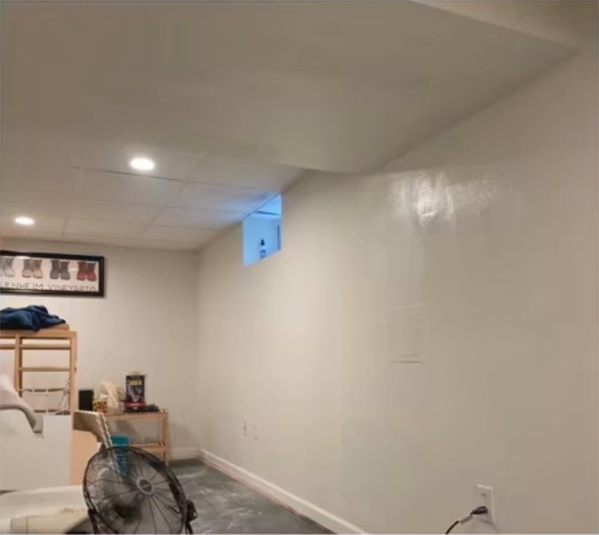 After basement ceiling repaint: finished painted ceiling and wall with cutouts closed